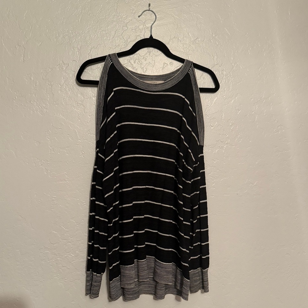 Black and white striped sweater with shoulder cut out